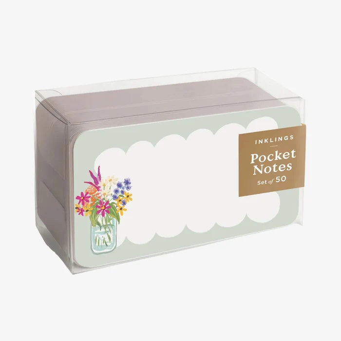 Packaged pocket notes with floral design and 'Inklings' branding on a white background