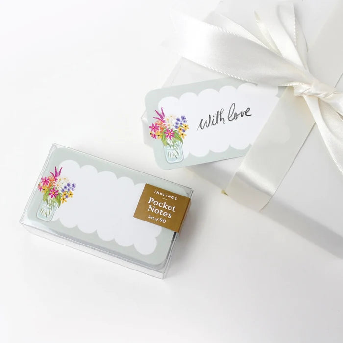Pocket notes with floral design packaging on a white background