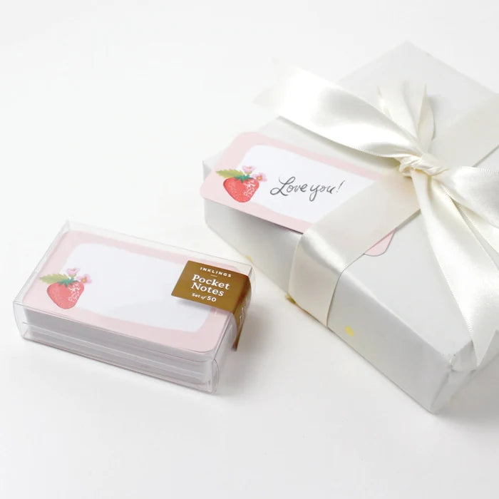 Pack of pocket notes with a decorative box on a white background