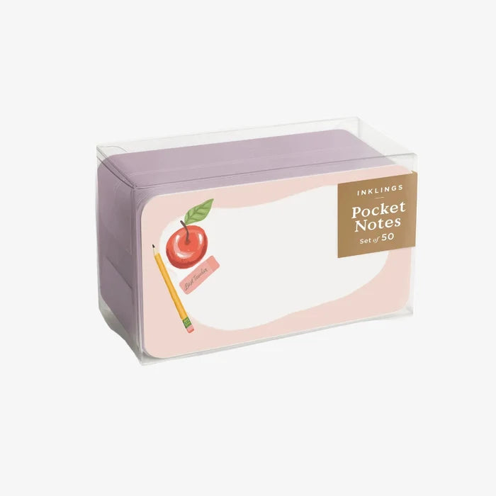 Box of pocket notes with an apple and pencil illustration on a white background