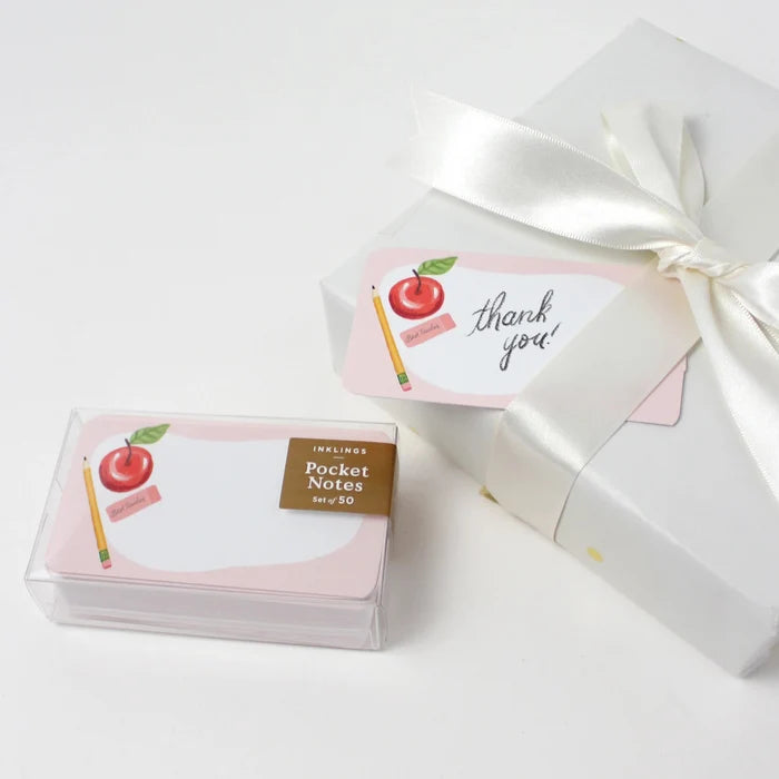 Pack of pocket notes with an apple design and a 'thank you' card in a decorative box on a white background.