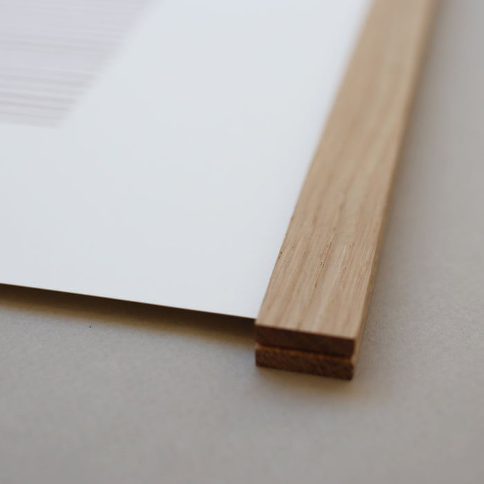 An oak frame with a magnetic closure.