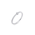 Silver stainless steel pavé ring with round cubic zirconia center stone, delicate minimalist band, hypoallergenic non-tarnish durable jewelry, elegant modern stacking ring for everyday wear.