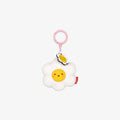 Plush toy shaped like a white and yellow flower with a smiling face on a white background