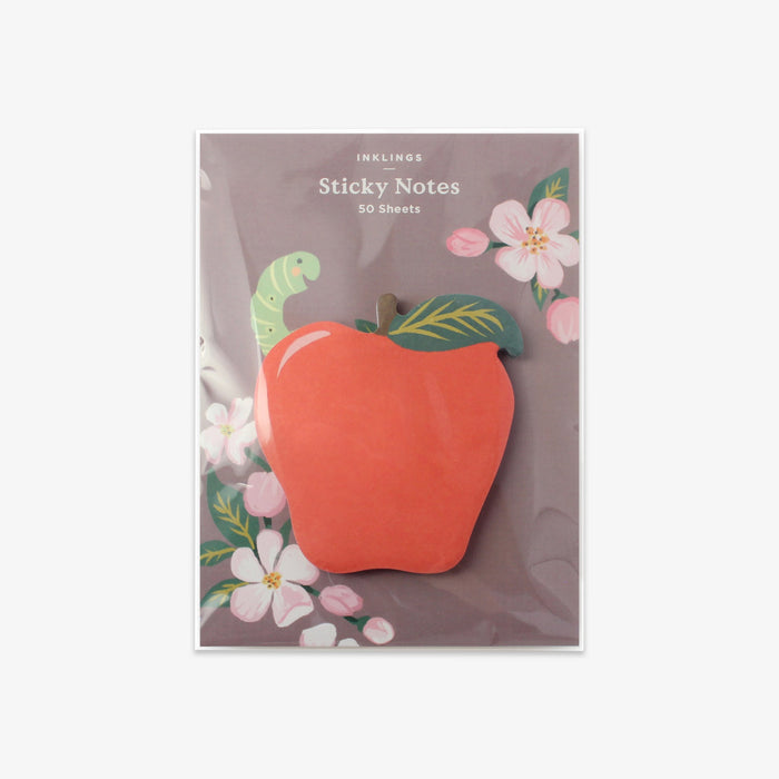 Sticky notes with an apple design on a grey background