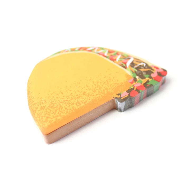 Taco-shaped sticky note with on a white background