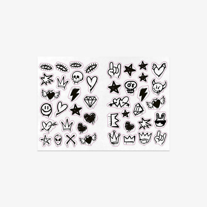 Sheet of black tattoo designs on a white background
