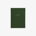 A green, hardcover cloth-bound notebook with the word 'JOURNEYS' printed on the cover in capital letters.