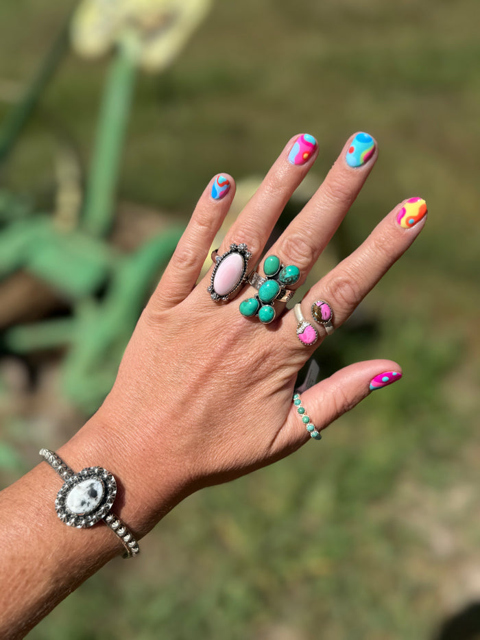 Turq X Ring (shown on middle finger)