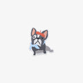 Vinyl sticker of a bulldog with a blue bandana, and red hat on a white background