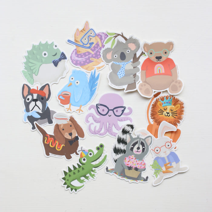 Set of colorful animal vinyl stickers on a white background