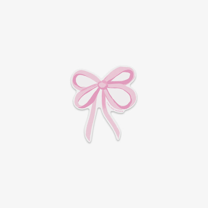 Vinyl sticker of a decorative pink bow on a white background.