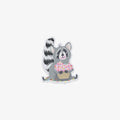 Vinyl sticker of a raccoon holding a cupcake on a white background