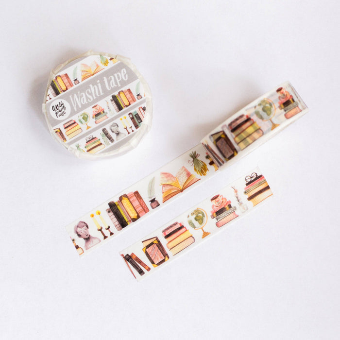 Decorative washi tape with colorful designs of books on a white background