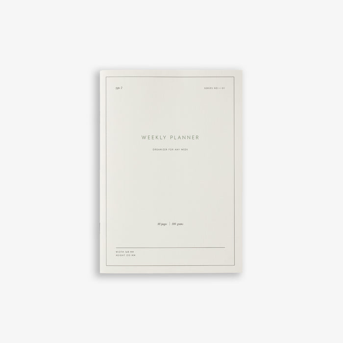 A white weekly planner notebook titled 'Weekly Planner'.