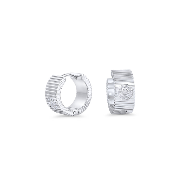 Silver ribbed huggie hoop earrings with pavé detail in stainless steel, bold modern statement earrings, tarnish resistant and hypoallergenic jewelry for sensitive ears in Canada.